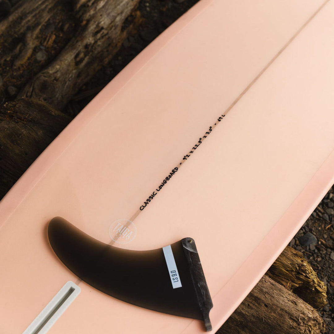 Fin View of The Longboard Surf Board in The Rosé Color