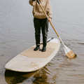 Girl paddling with the Performance Root Collection Paddle by TAIGA