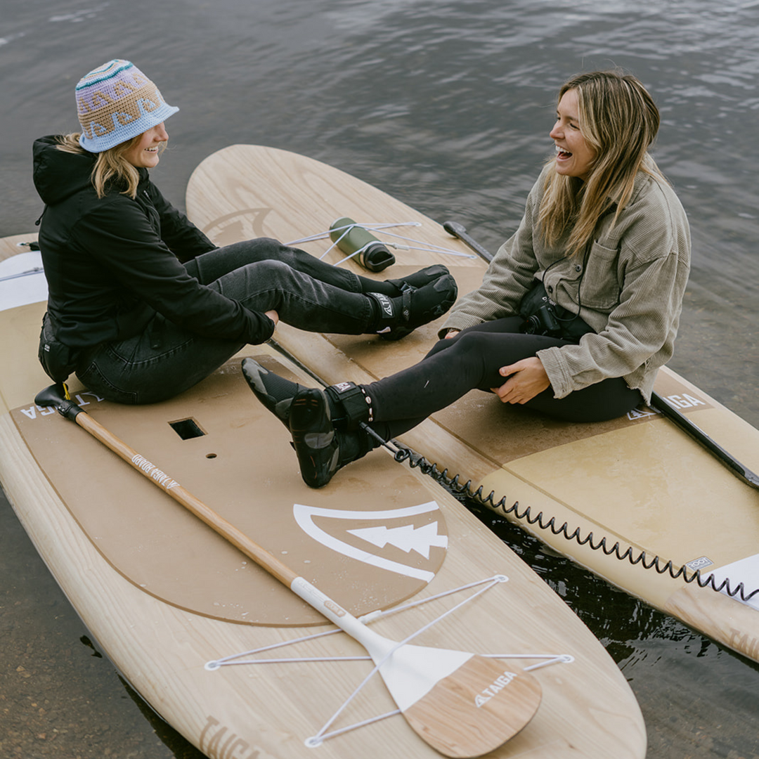 Paddlers laughing on Awen and Akoya Root