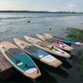 Row of The New Hard Boards Collection On a Dock