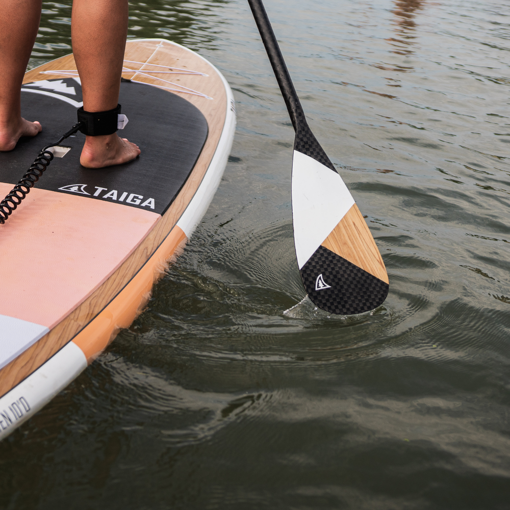 Diamond Asymetric Carbon Wood Paddle from TAIGA on a lake