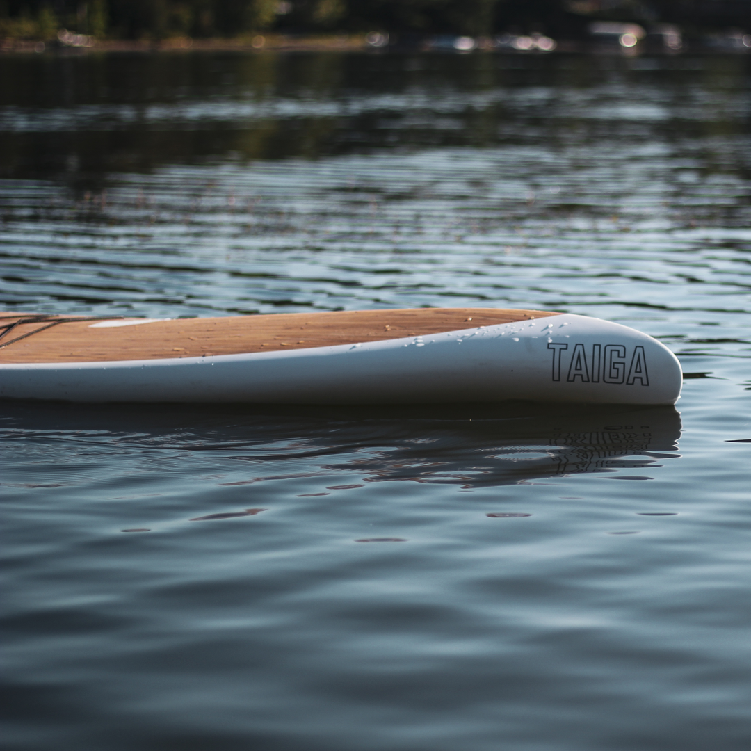 Nose of the Kazuzu 12'6 green on a lake