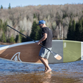 Paddler with the Kazuzu 12'6 green