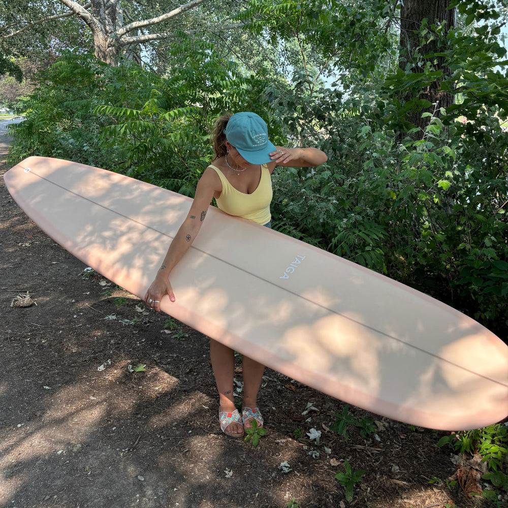 Girl wearing the Dad Hat Surf & Paddle in Dark Mint Color