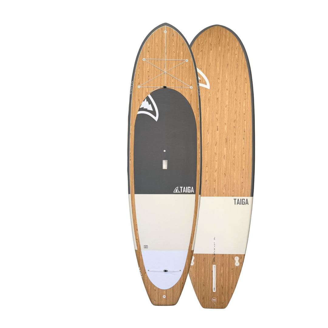 Wooden paddle boards with a visible brand logo on a white background