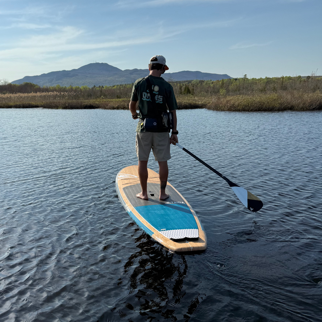 Back View of a Paddler On The Borea 10'6" in Color Sea Blue 