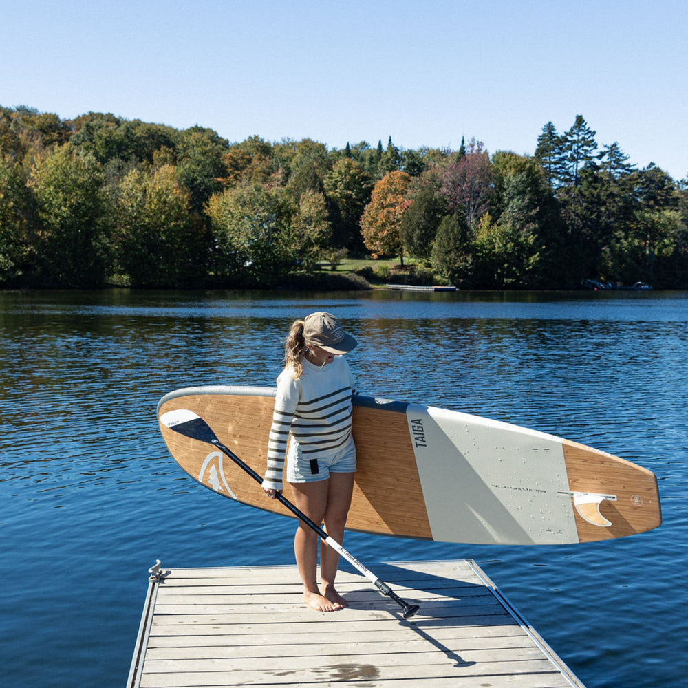 Paddler with The Borea 10'6" in Color White