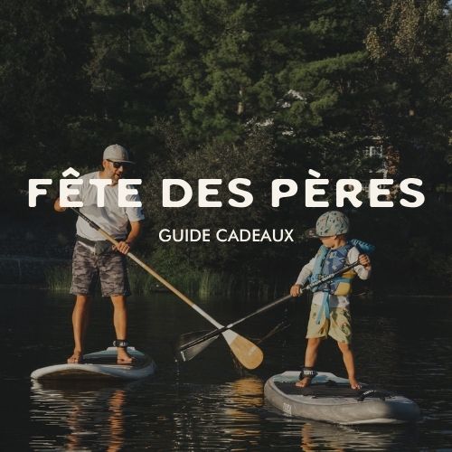 Two people paddleboarding on a lake with 'Féte des Pères' text overlay.