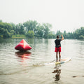 Paddler on a lake with the Kazuzu 12'6 Pine