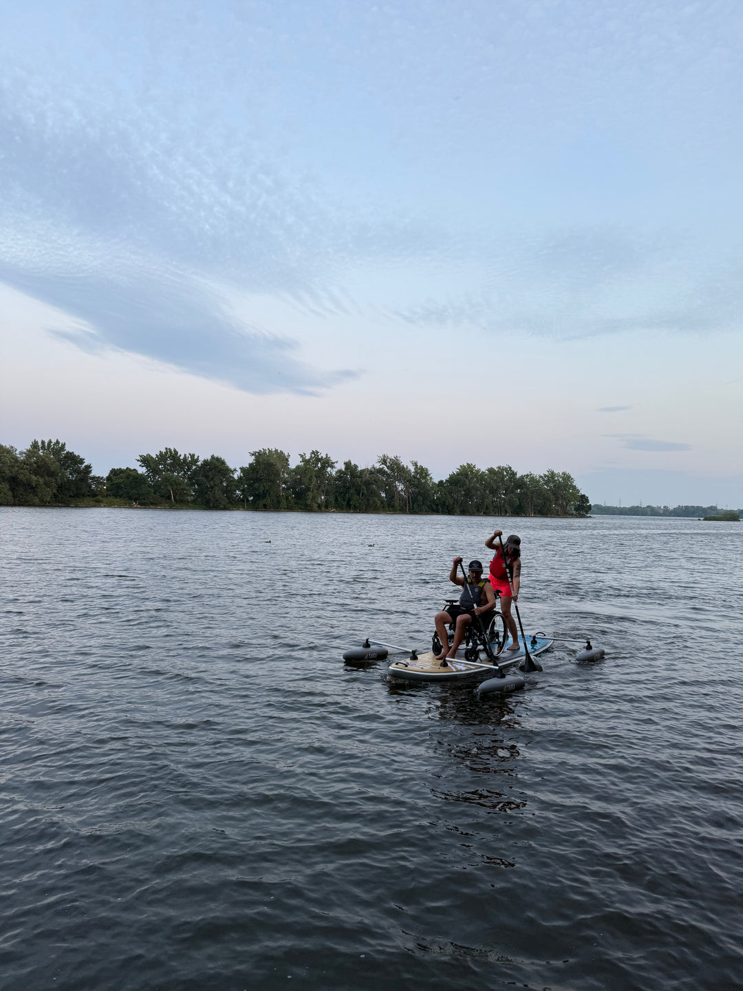 2 Paddlers On The Adaptive SUP