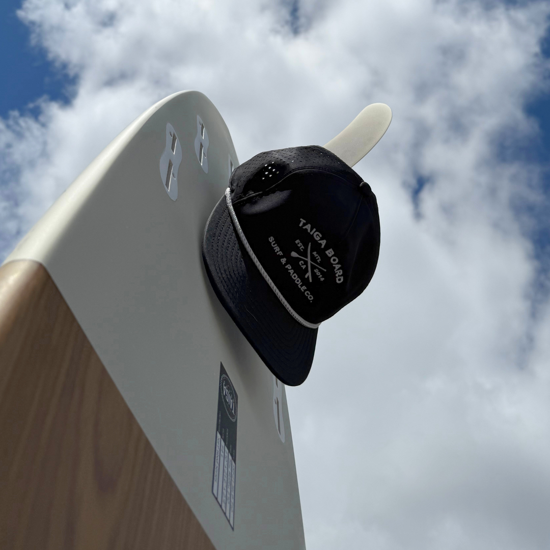 Side View of the Mesh Surf & Paddle Co. Cap on the Surf's Fin