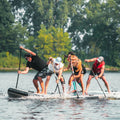 Paddlers racing on the Sequoia Air 16'5" Party SUP