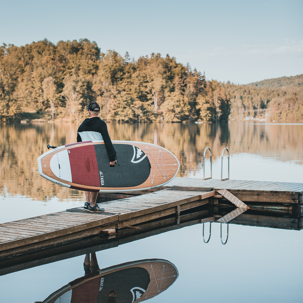 Paddler on the Awen 10'0 Burgundy by TAIGA BOARD