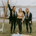 Girls in wetsuit wearing the after surf WETSUIT SEASON CREWNECK - SAND & BLUE