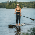 Girl paddling with the Performance Paddle Carbon Wood by TAIGA
