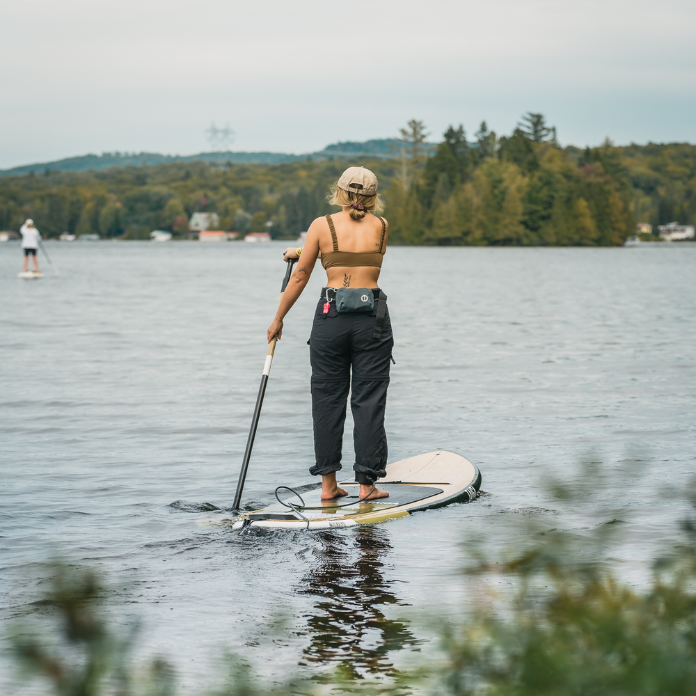 Paddler with the minimalist PFD Belt Pack by MUSTANG