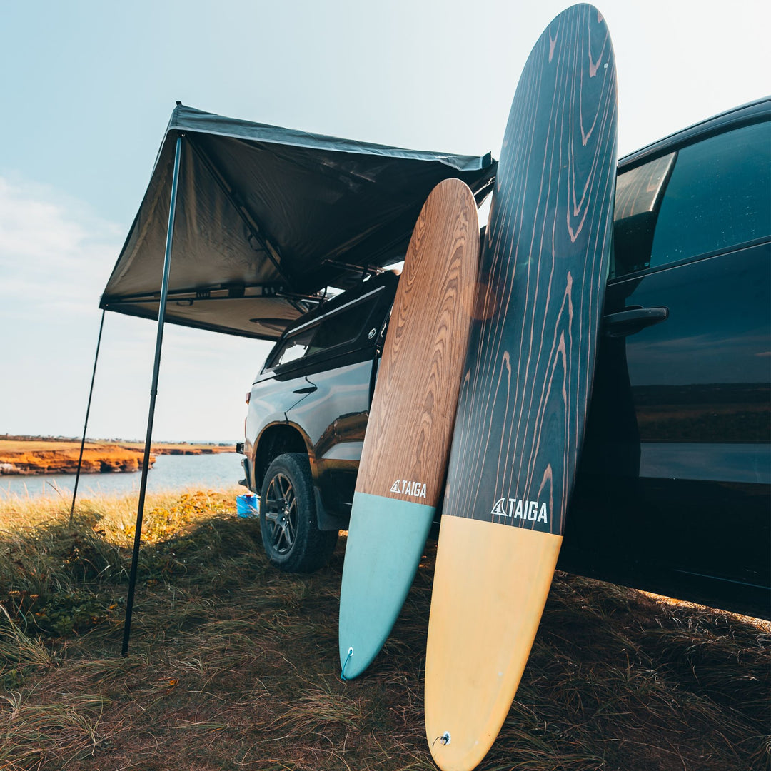 Longboard 9'0" Surf Board Leaning on a Camping VAN 