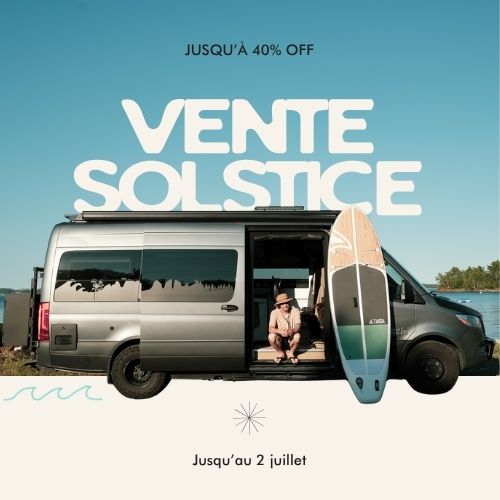 Van with open door, person sitting inside, and paddleboard on a scenic background with promotional text overlay.