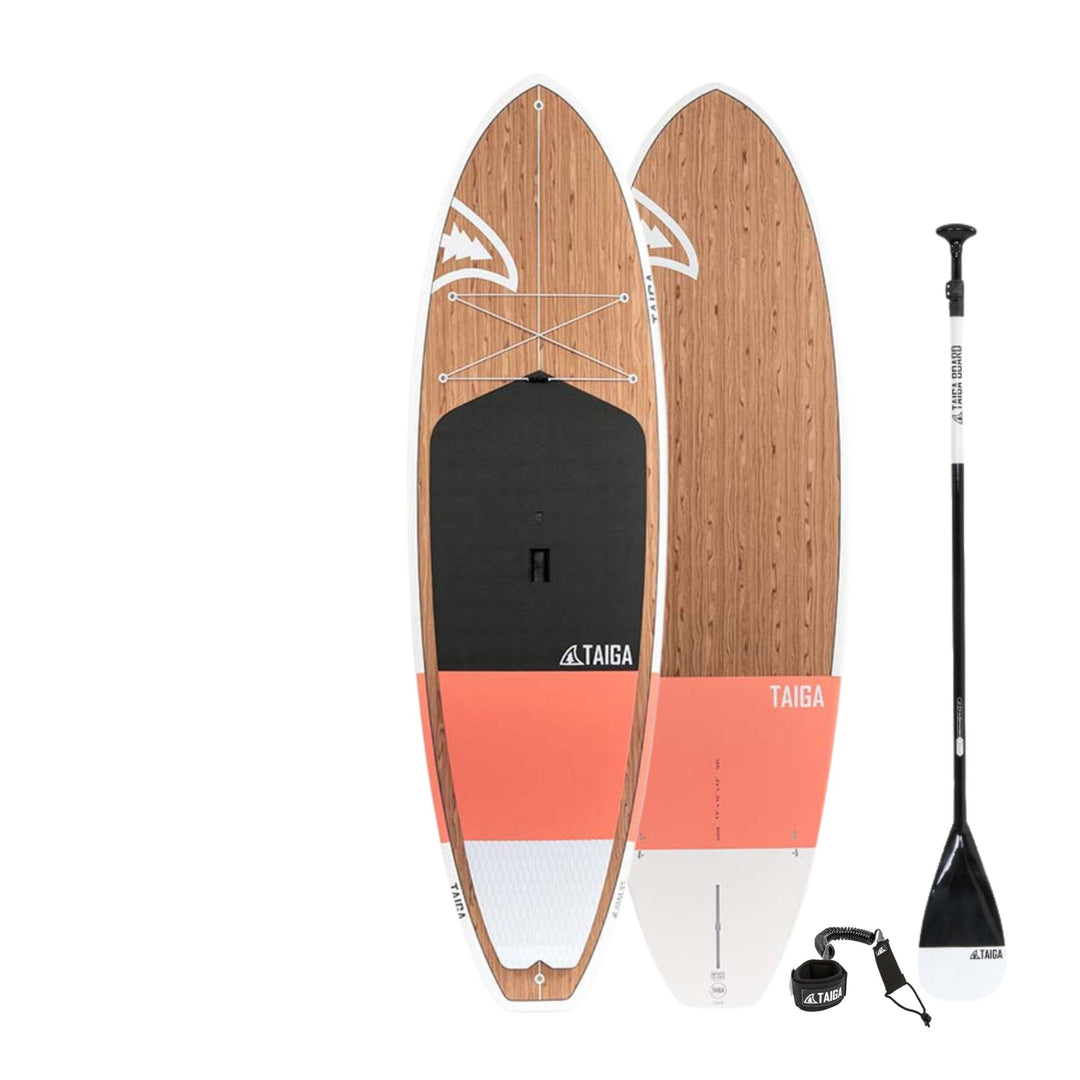 Wooden paddleboard with orange bottom and black paddle on a white background