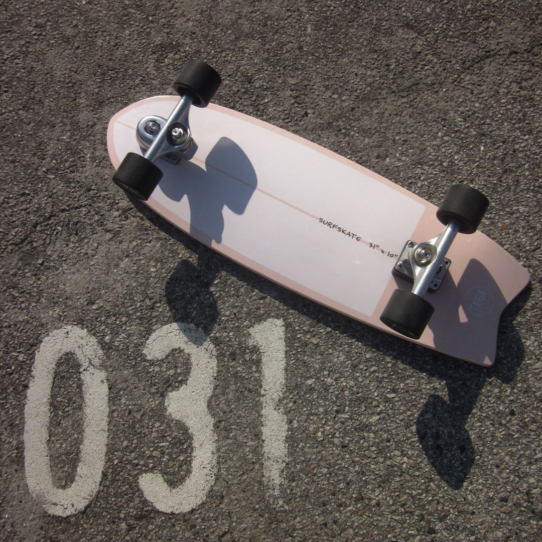 Skateboard on an asphalt surface