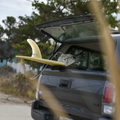 CENTER FIN - FIBERGLASS DOLPHIN SURF LS in a car