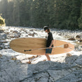 Boy holding the Borea 10'6 - Root Collection