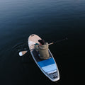 Boy on a lake with the Borea Air 10'6 blue 