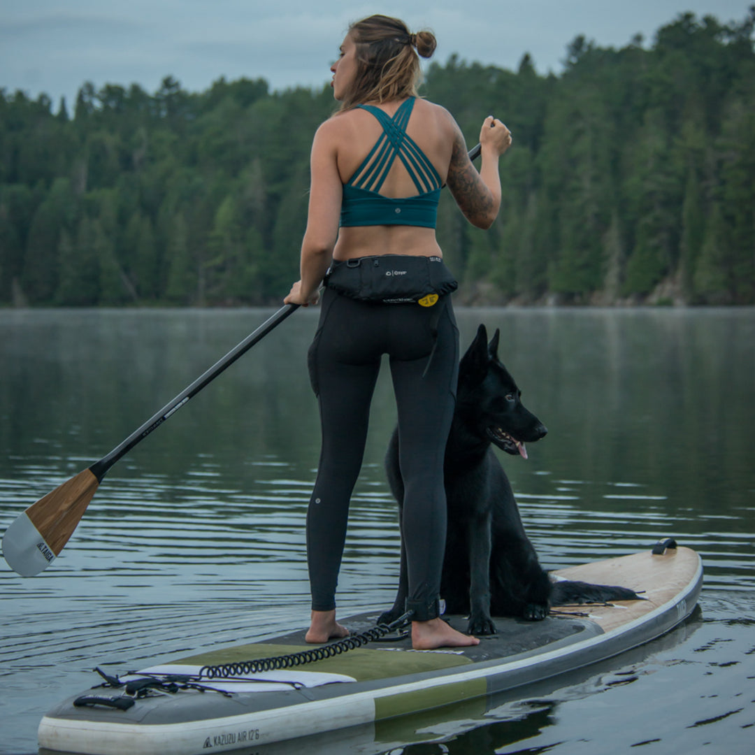 Paddler with a dog on the Kazuzu Air 12'6 green