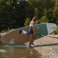 Girl paddling with the Diamond Asymetric Carbon Wood Paddle from TAIGA