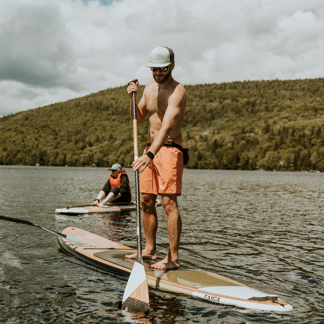 Paddler with the Diamond Asymetric Carbon Wood Paddle from TAIGA