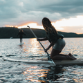 Girl paddling with the Diamond Carbon Wood Paddle by TAIGA