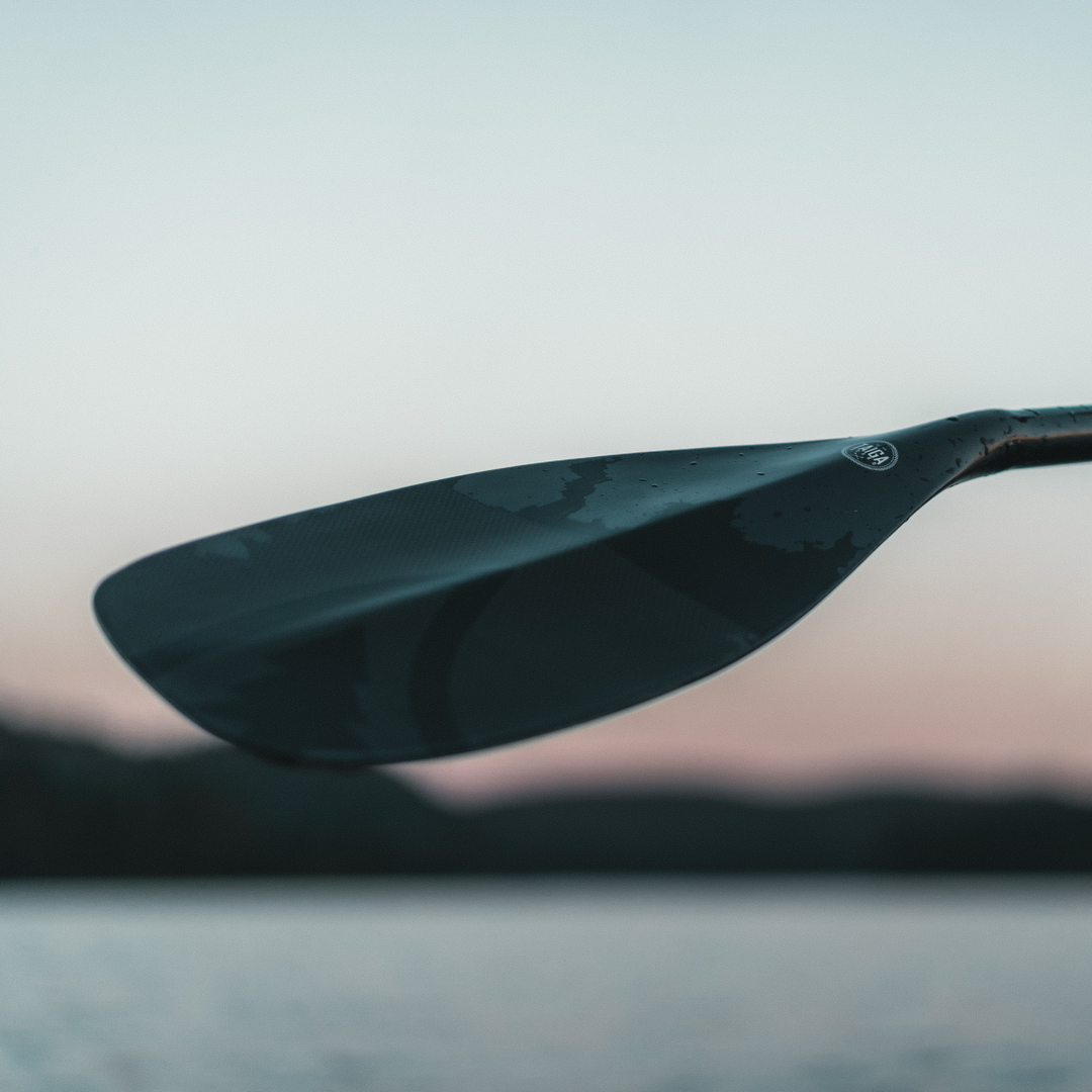 Elite Paddle All Black by TAIGA at sunset