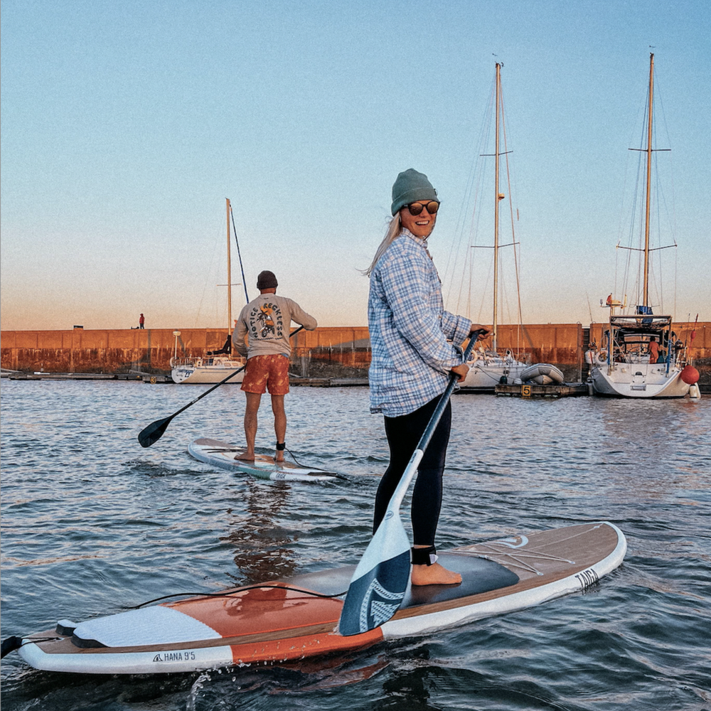 Paddler with the Elite Paddle White by TAIGA