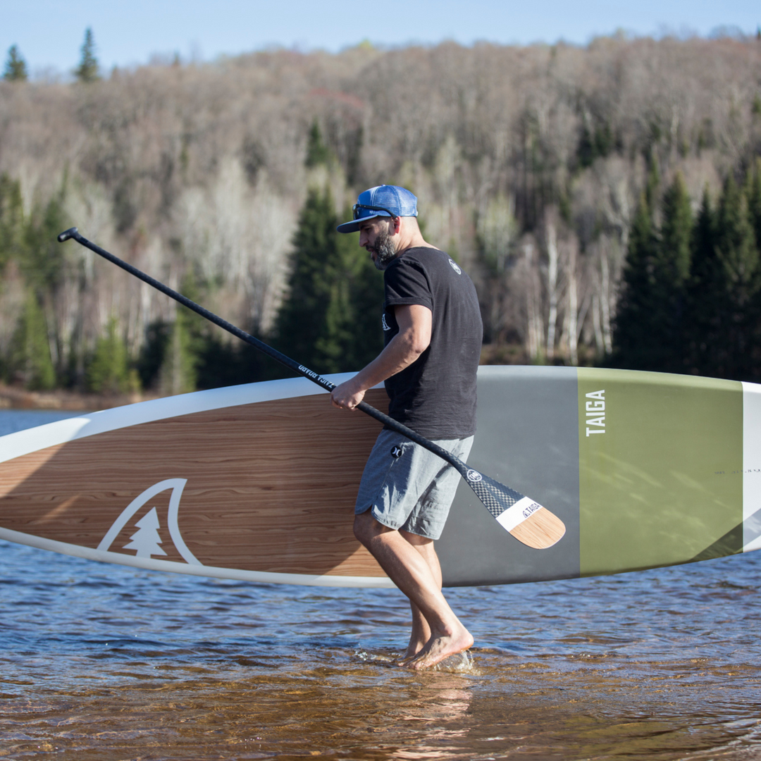 Paddler with the Kazuzu 12'6 green