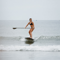 Girl SUP surfing on Akoya 9'5