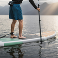 Paddler on a lake with the Nano Zip Air 9'8 - Compact SUP