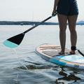 Turquoise Hybrid Paddle by TAIGA on a lake with the Awen Turquoise 10'0 Hard SUP