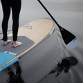 White Hybrid Paddle by TAIGA on a lake with the Boréa Blue 10'6 Hard SUP