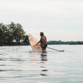 Paddler doing a Pivot on the Kazuzu 12'6 - Root Collection